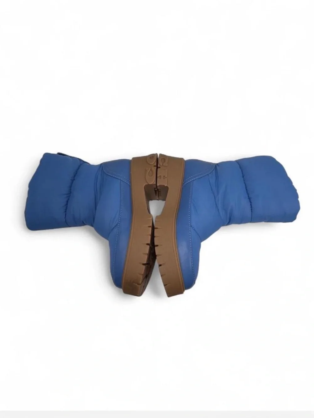 Coach Rya Boots inSky Blue. Quilted puffer-style nylon, leather upper.